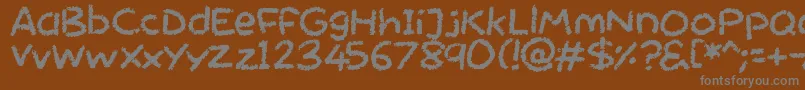 Шрифт Chalktastic – серые шрифты на коричневом фоне