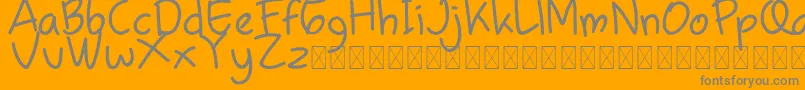 Chamilla Kids Regular-Schriftart – Graue Schriften auf orangefarbenem Hintergrund