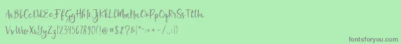 Chamille Font – Gray Fonts on Green Background