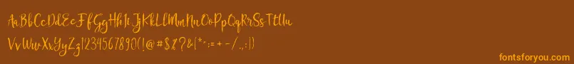 Chamille Font – Orange Fonts on Brown Background