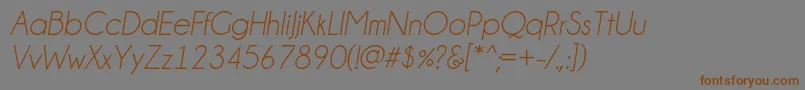 フォントChampagne  Limousines Italic – 茶色の文字が灰色の背景にあります。