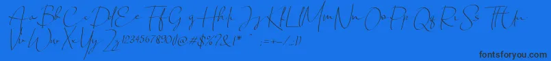 Chandrawinata italic-Schriftart – Schwarze Schriften auf blauem Hintergrund