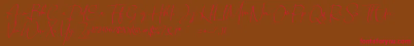 Chandrawinata italic Font – Red Fonts on Brown Background