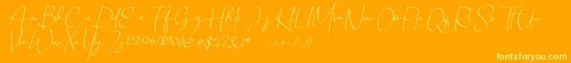 Chandrawinata italic-Schriftart – Gelbe Schriften auf orangefarbenem Hintergrund