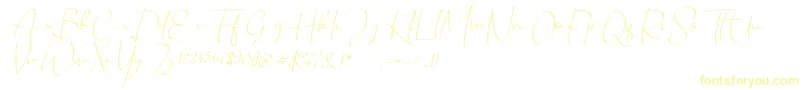 フォントChandrawinata italic – 黄色のフォント