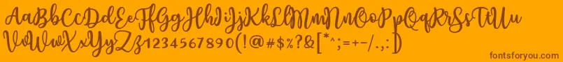 Fonte Charilla Font by Situjuh 7NTypes – fontes marrons em um fundo laranja