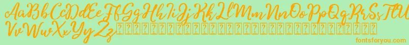 Charitta Font – Orange Fonts on Green Background