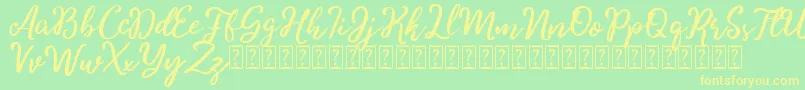 Charitta Font – Yellow Fonts on Green Background