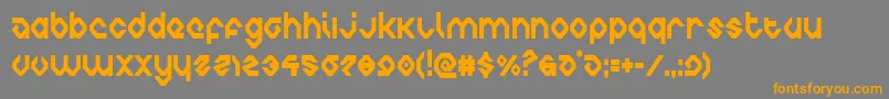 フォントcharliesanglescond – オレンジの文字は灰色の背景にあります。