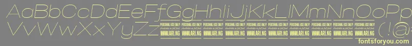 SpecifypersonalExpthinitalic Font – Yellow Fonts on Gray Background