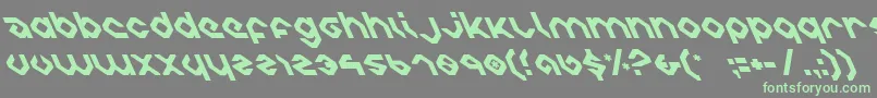 charliesanglesleft-Schriftart – Grüne Schriften auf grauem Hintergrund
