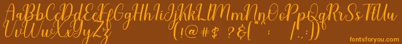 Charliez Demo Font – Orange Fonts on Brown Background