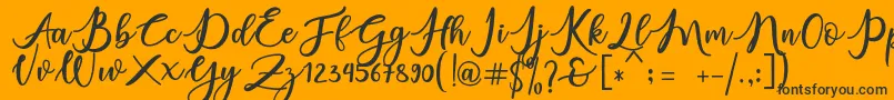 charlinda Font – Black Fonts on Orange Background