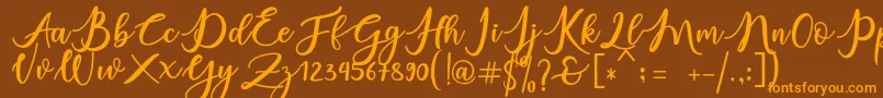 Fonte charlinda – fontes laranjas em um fundo marrom