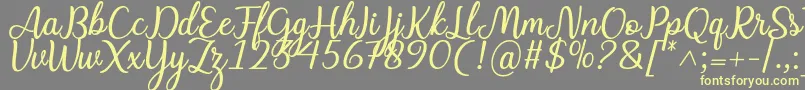 Charline font-Schriftart – Gelbe Schriften auf grauem Hintergrund