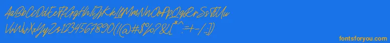 フォントCharlion Slant Script – オレンジ色の文字が青い背景にあります。