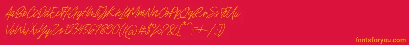 フォントCharlion Slant Script – 赤い背景にオレンジの文字