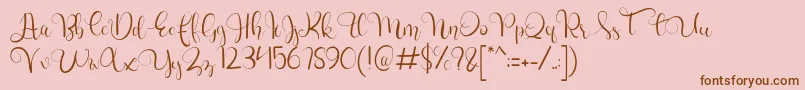 charllie Personal Use-Schriftart – Braune Schriften auf rosa Hintergrund