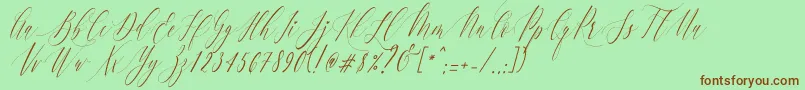 Fonte Charlotte Calligraphy   Slant R1 – fontes marrons em um fundo verde