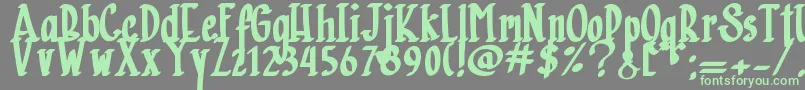 Charlotte Paraline  -Schriftart – Grüne Schriften auf grauem Hintergrund