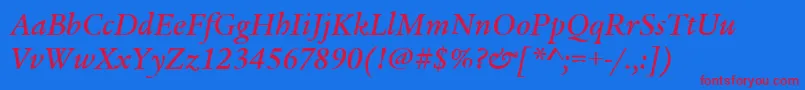 LegacySerifItcMediumItalic-fontti – punaiset fontit sinisellä taustalla
