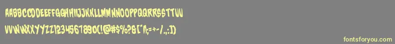 charmlingrotate-Schriftart – Gelbe Schriften auf grauem Hintergrund