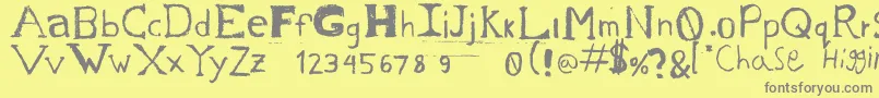 フォントChase s Sketch – 黄色の背景に灰色の文字