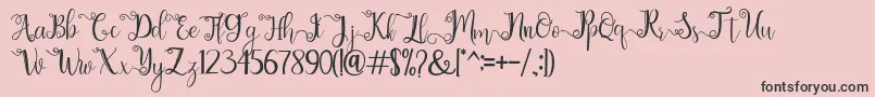 chathaleya-Schriftart – Schwarze Schriften auf rosa Hintergrund