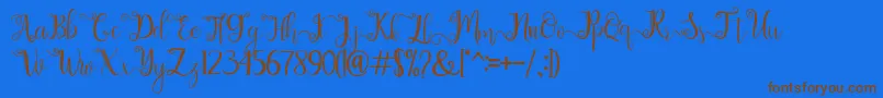 chathaleya Font – Brown Fonts on Blue Background