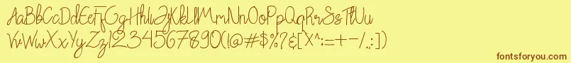 Chattagirie Bold Font – Brown Fonts on Yellow Background