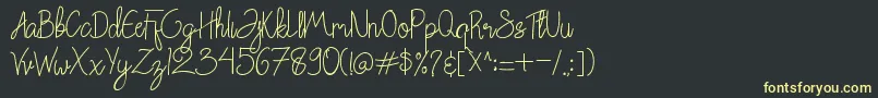 Chattagirie Bold Font – Yellow Fonts on Black Background
