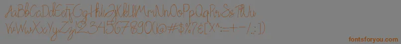 Шрифт Chattagirie – коричневые шрифты на сером фоне