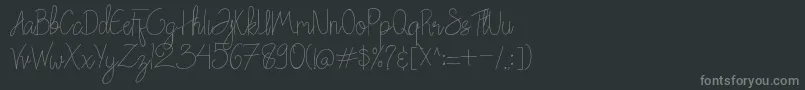Chattagirie Font – Gray Fonts on Black Background