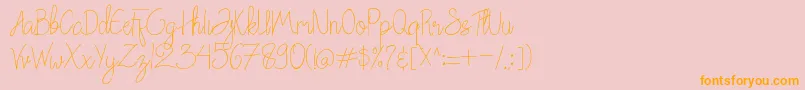 フォントChattagirie – オレンジの文字がピンクの背景にあります。