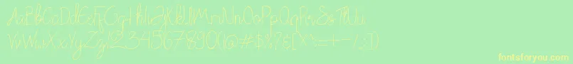 フォントChattagirie – 黄色の文字が緑の背景にあります