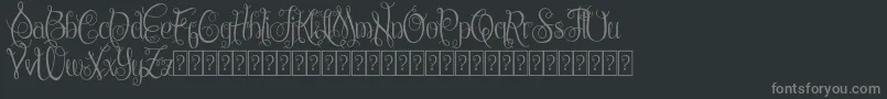 フォントChattelyneDemo – 黒い背景に灰色の文字