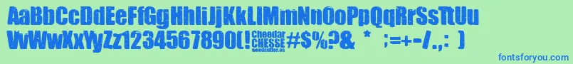 Cheedar Cheese-Schriftart – Blaue Schriften auf grünem Hintergrund