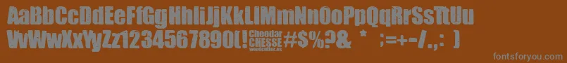 Cheedar Cheese Font – Gray Fonts on Brown Background