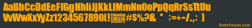 Cheedar Cheese-Schriftart – Orangefarbene Schriften auf schwarzem Hintergrund