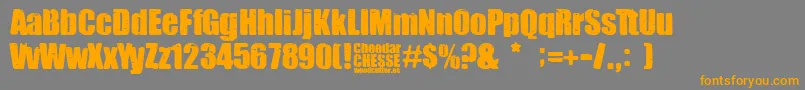 フォントCheedar Cheese – オレンジの文字は灰色の背景にあります。