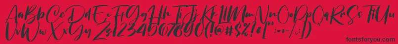 Chellyne Font – Black Fonts on Red Background