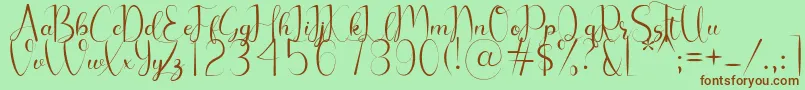 Chelosia Font – Brown Fonts on Green Background