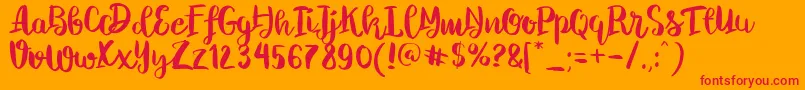 Chelsea Brush Script Font – Red Fonts on Orange Background