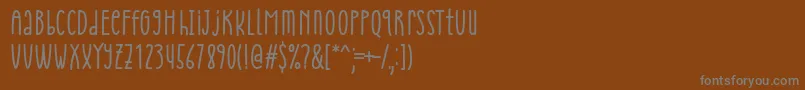 フォントCheria Font by Situjuh 7NTypes – 茶色の背景に灰色の文字