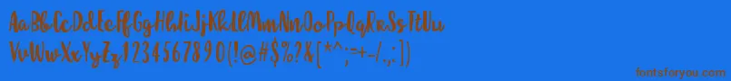 MolleatRegular-Schriftart – Braune Schriften auf blauem Hintergrund