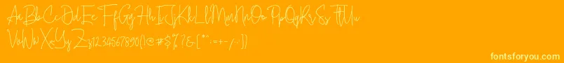 Cherill Font – Yellow Fonts on Orange Background