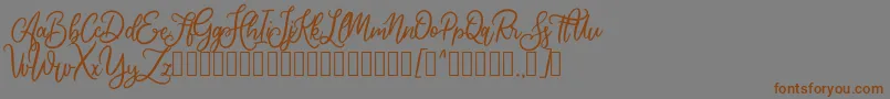 Cherishia Demo-Schriftart – Braune Schriften auf grauem Hintergrund