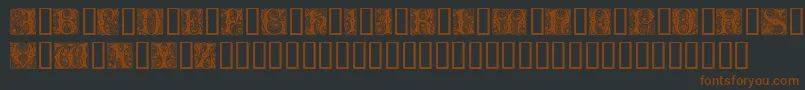 Cheshire Initials-fontti – ruskeat fontit mustalla taustalla