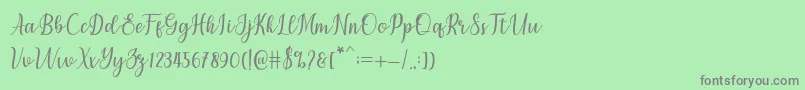 フォントchetlie – 緑の背景に灰色の文字