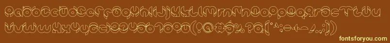 chewedkandi outline Font – Yellow Fonts on Brown Background